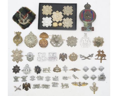 A collection of military cap and other badges, to include the Seaforth Highlanders, Black Watch, Argyll and Sutherland Highla