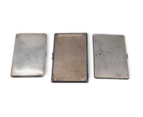 A stamped sterling cigarette case, the body with a hammered finish, another cigarette case, and two Birmingham examples, with