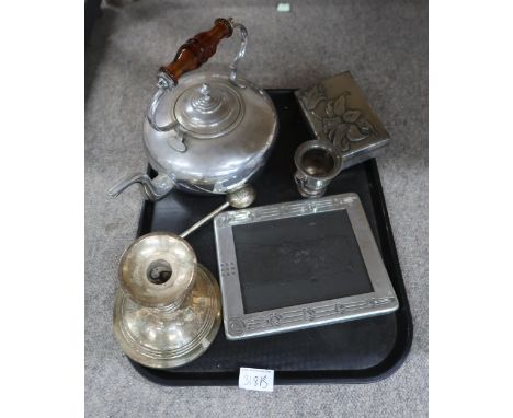 An EPNS Mackintosh style photo frame, a large candlestick, a pewter box decorated with a lily, a tea pot, a kettle, and a sal