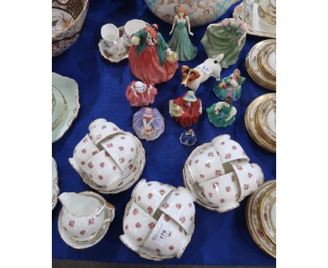 Assorted figures including eight Royal Doulton ladies and and girls, Royal Worcester Noel, a Beswick Jack Russell, together w