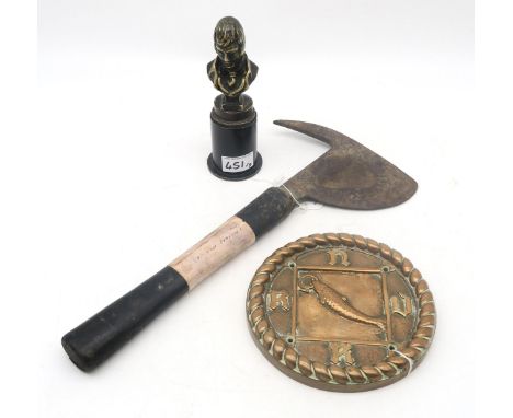 A WW2 glider/aircraft escape axe, the head with Broad Arrow stamp, the rubber handle with label affixed reading "Found at Die