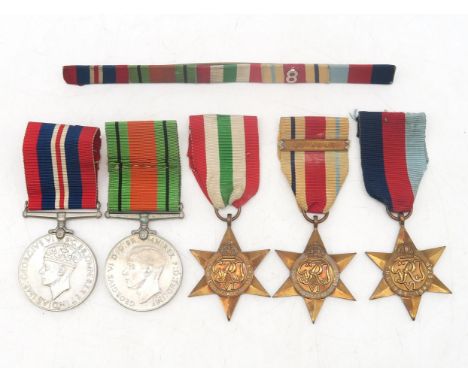 A WW2 medal group of five, comprising War Medal, Defence Medal, 1939-1945 Star, Italy Star and Africa Star with 8th Army clas