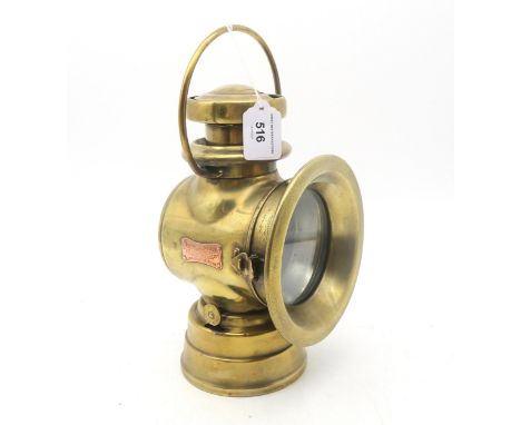 A brass Lucas "King of the Road" automotive lamp, no. 724, measuring approx. 25.5cm in height, excluding handle Condition Rep