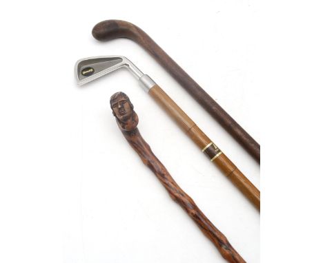 A thornwood folk art walking stick, with handle with pommel carved as the head of Robert Burns, a "Bronty" example with a gol