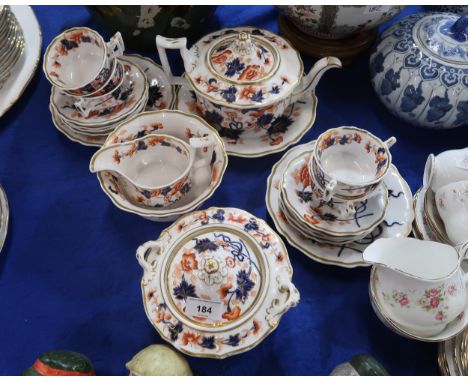 An early 19th century imari pattern teaset comprising teapot, cups, saucers, jug, sugar pot, bowl etc, pattern number 2/1131 