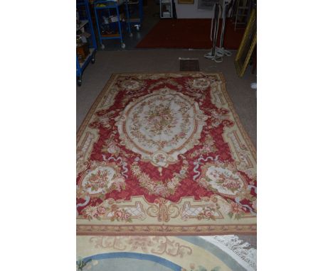 An Abuson type woolwork tapestry of floral decoration.