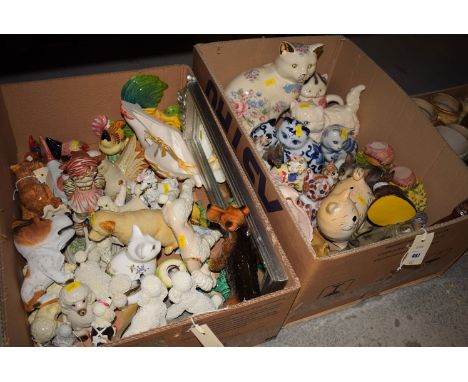 A quantity of household ceramic ornaments, to include: cats; dog and others, in two boxes.