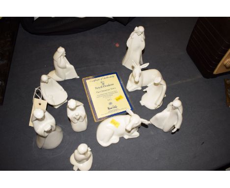 A set of ten modern Royal Doulton ceramic nativity figures, titled "The Christmas Story", with a limited edition no. 583 cert