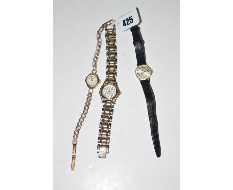 A 9ct. yellow gold Regency ladies cocktail watch; together with a Tissot; and a Krug Baumen watch.