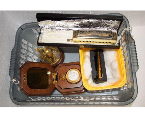 Two harmonicas, one by Honer; a Morgan 'Silver Dollar' collection watch; together with a similar watch in glass dome.  (4)