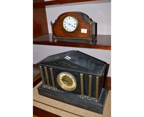 A mantel clock in architectural slate case fitted brass pillars and arabic dial; together with an oak cased mantel clock with