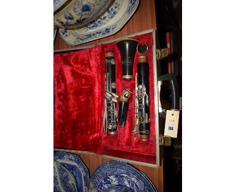 A Corton clarinet in fitted case.
