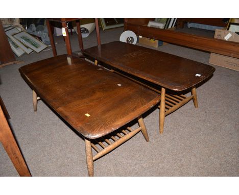 A pair of Ercol dark stained rectangular occasional tables.