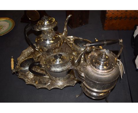 A seven-piece EPBM afternoon tea service, comprising: spirit kettle and stand, tea and coffee pots, cream and sugar bowls, an