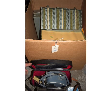 A quantity of slide boxes and containers; and a Harmony projector.