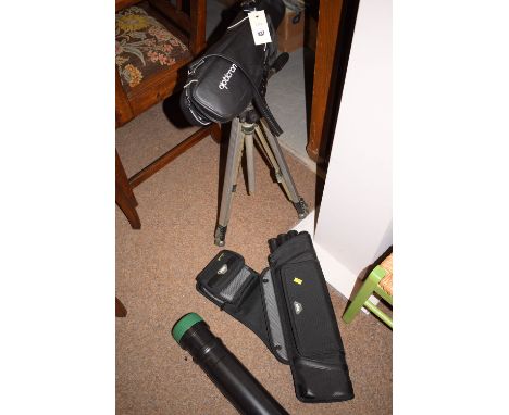 A Spectrom spotting scope with tripod.