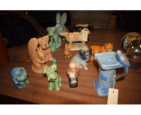 Two 19th Century cow creamers, one with orange sponge decoration; a quantity of silver ceramic animals, to include: rabbit; d