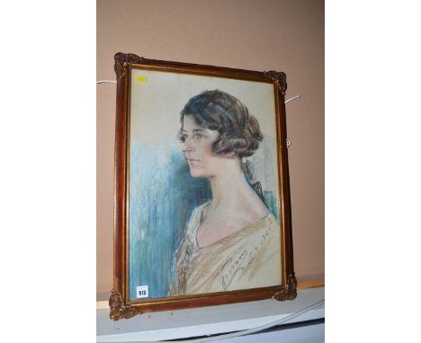 A pastel painting, by J. Pisani - a bust portrait of a young woman, signed and dated 28.9.1925.

