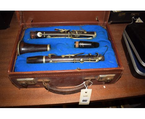 A vintage clarinet by Caltrau, in fitted case.