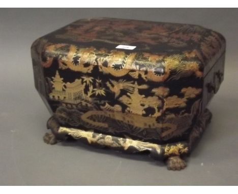 A C19th Chinese Exportware black lacquered work box with fine raised gilt chinoiserie decoration of pagodas and dragons, with