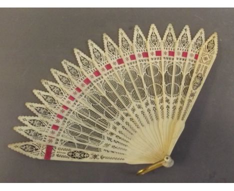 A small C19th Cantonese pierced ivory fan with threaded ribbon, 11'' extended