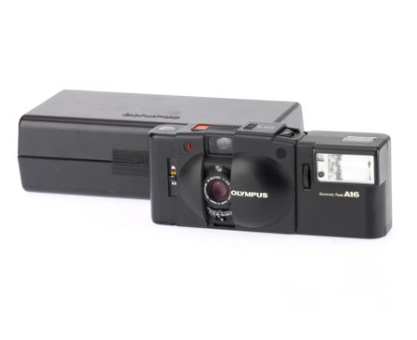 An Olympus XA2 35mm Compact Film Camera black, body VG, shutter fires, appears to meter for different light levels, with A16 
