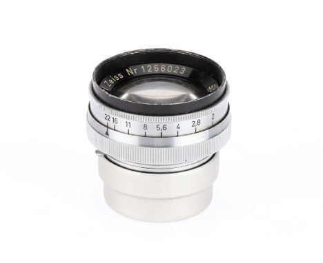 A Carl Zeiss Jena Sonnar f/2 5cm Camera Lens silver, serial 1256023, barrel F with some paint loss to front ring, optics F-G 
