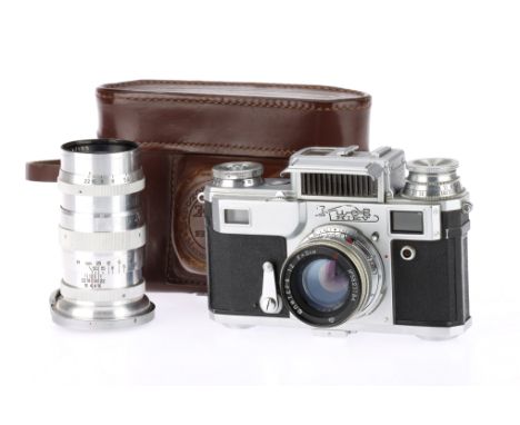 A Kiev IIIa Rangefinder Camera Outfit, silver, serial number 569734, body G, shutter not working, light meter responds to lig