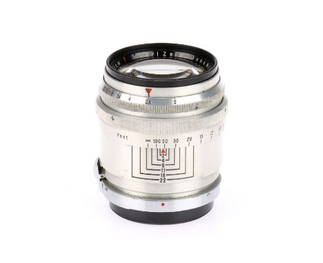A Carl Zeiss Jena Sonnar f/2 8.5cm Camera Lens chrome, serial 3060885, barrel F-G, wear marks, focus and aperture rings stiff