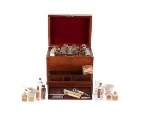 A 19th Century Domestic Medicine Chest, English, mahogany trunk-type chest with brass fittings, the lifting lid to compartmen