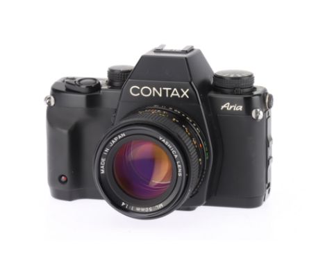 A Contax Aria 35mm SLR Camera body VG, powers up, shutter works, takes a picture, LCD and internal LED working, with Yashica 