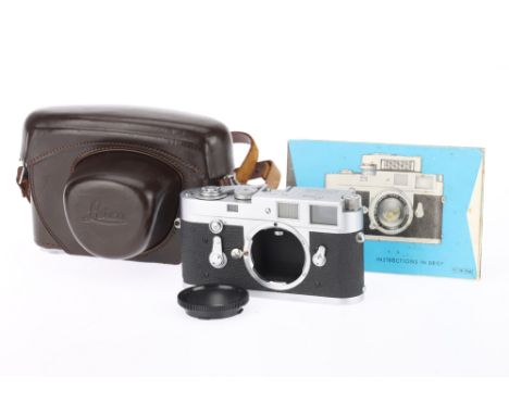 A Leica M2 35mm Rangefinder Camera Body, silver, serial number 946824, body G-VG, light paint wear to rear and very light mar