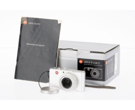A Leica D-LUX 2 Ultra Compact Digital Camera, silver, body VG, charges, switches on, takes a picture, zooms, in maker's packa