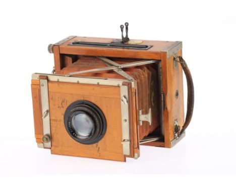 A Contessa-Nettel Duckrullo Tropen Folding Strut Camera, teak, body G, shutter working but requires service, speeds incorrect