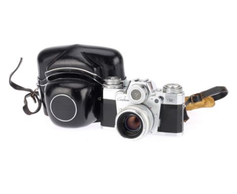 A Zeiss Ikon Contarex "Bulls-Eye" 35mm SLR Camera chrome, 1959-66, serial no.G32876, with a Carl Zeiss Planar f/2 50mm lens, 