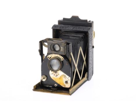 A Newman &amp; Guardia Model 7 Folding Plate Camera, black, serial no. S124S, body F-G, shutter not working, focussing jammed