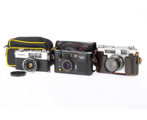A Group of Yashica 35mm Film Cameras, comprising a Yashica YK, silver, body G, shutter sticky at slow speeds, optics F with d