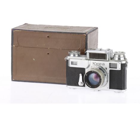 A Kiev IIIa Rangefinder Camera, silver, serial number A556021, body G, shutter working but curtains are slow, light meter res
