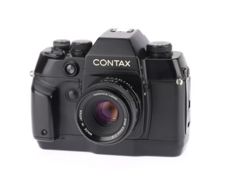 A Contax AX 35mm SLR Camera powers up when battery inserted, shutter works, internal and external displays work, body G, base