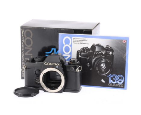 A Contax 139 Quartz 35mm SLR Camera Body in Manufacturers Packaging body E, powers up and works, internal display is working,