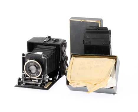 A Soho Precision Medium Format Folding Plate Camera black, c1930, 2½x3½in format, with a Ross Xpres f/4.5 112mm lens in a Com