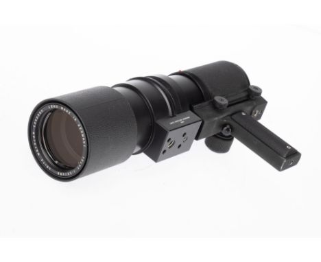 A Leitz Wetzlar Telyt f/5.6 400mm Camera Lens, black, serial number 2252397, body VG, with pistol grip extension, optics VG, 