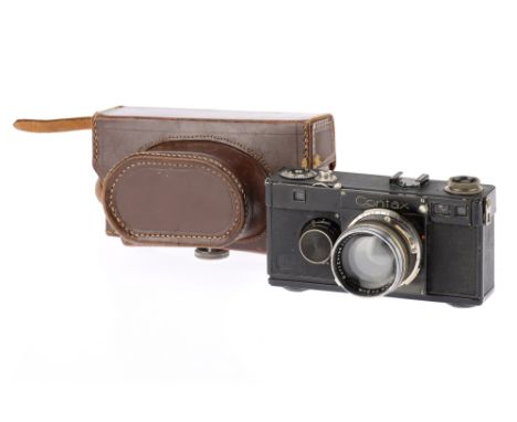 A Zeiss Ikon Contax I 35mm Rangefinder Camera black, 1933/34, serial no.V32487, with a Carl Zeiss Jena Sonnar f/1.5 5cm (50mm