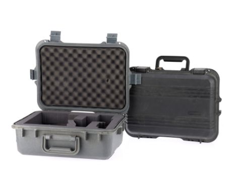 Two Doskocil "Peli-Style" Polypropylene Hard Cases light grey and dark grey, dark grey is missing side clamps, both internall