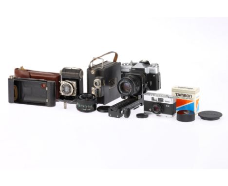 A Selection of 35mm Film Cameras and accessories to include a Zenit EM, shutter fires but slow speeds sound inaccurate, mount