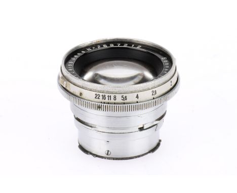 A Carl Zeiss Jena Sonnar f /2 5cm Camera Lens silver, serial 2687212, barrel F with small dent to filter ring, optics F with 