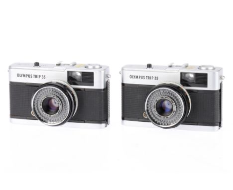 A Pair of Olympus Trip 35 Compact Viewfinder Cameras bodies G, shutters work, both appear to respond to light, one has slow a