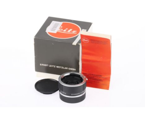 A Leitz Extender-R 2x for Leica R black, 1982, catalogue ref.11236, serial no.3177025, for Leica R cameras, body G, optics G,