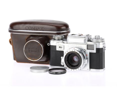 A Zeiss Ikon Contax IIIa 35mm Rangefinder Camera chrome, 1954-61, serial no.R34836, late model with PC flash socket and red 1