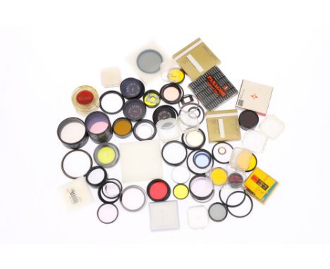 A Large Mixed Selection of Circular Camera Lens Filter Many sizes and types, and colours.
